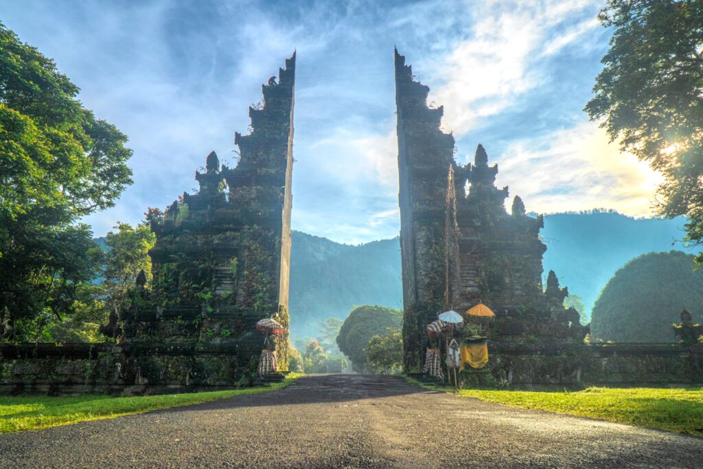 Balinese Hindu Temple – Cultural and Spiritual Landmark in Bali, Indonesia Traditional Balinese Hindu temple surrounded by lush greenery and intricate stone architecture in Bali, Indonesia